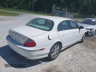 2003 Jaguar S-Type with VIN SAJEA01U93HM89560, listed as a IAAI auction lot 42115289 with 236,905 mi miles and . Bid and sale history available at DreamBid. Image 4.