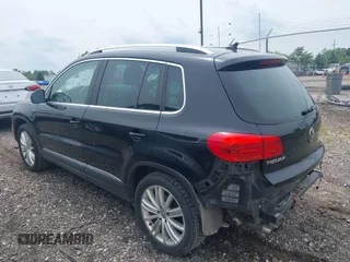 2013 Volkswagen Tiguan S with VIN WVGBV3AX7DW611410, listed as a IAAI auction lot 42549561 with 115,855 mi miles and . Bid and sale history available at DreamBid. Image 3.