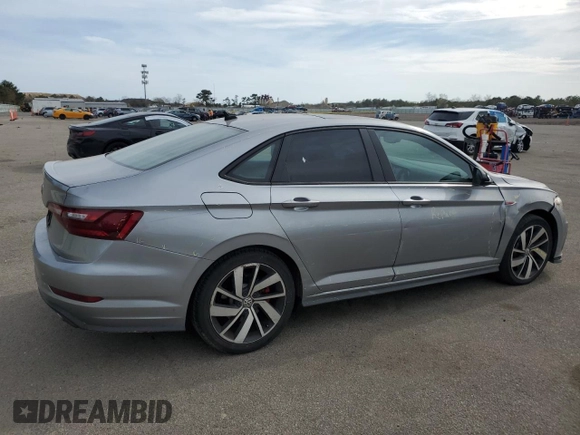 2021 Volkswagen Jetta GLI S с VIN 3VW6T7BU5MM095245, выставлен на аукционе Copart как лот 53602815 с пробегом 36 296 миль миль и Списание • Salvage title. История ставок и продаж доступна на DreamBid. Изображение 3.