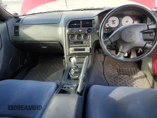 1997 Nissan Skyline z VIN BCNR33042682, wystawiony jako Copart lot #76562674 z przebiegiem 61 791 mil mil oraz Czysty tytuł • Clean title. Historia ofert i sprzedaży dostępna na DreamBid. Obrazek 8.