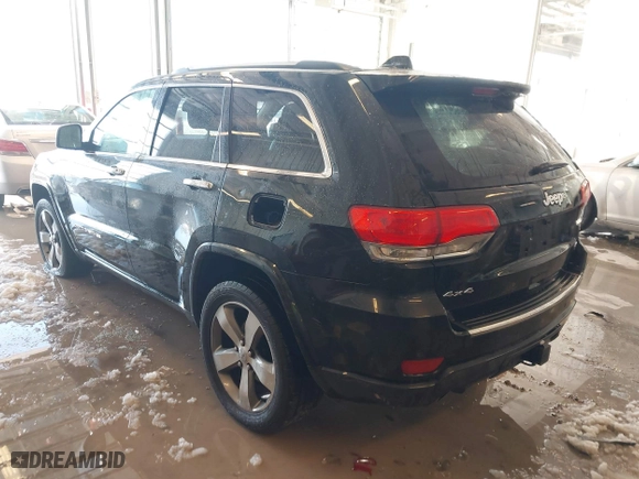 2014 Jeep Grand Cherokee Overland with VIN 1C4RJFCT7EC187319, listed as a IAAI auction lot 41256107 with 98,287 mi miles. Bid and sale history available at carsss.com. Image 3.
