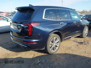 2021 Cadillac XT6 Premium Luxury with VIN 1GYKPFRS9MZ141298, listed as a IAAI auction lot 41304705 with 87,470 mi miles. Bid and sale history available at carsss.com. Image 4.