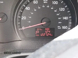2014 Kia Sorento LX with VIN 5XYKT4A63EG457302, listed as a IAAI auction lot 41859779 with 122,724 mi miles. Bid and sale history available at carsss.com. Image 7.