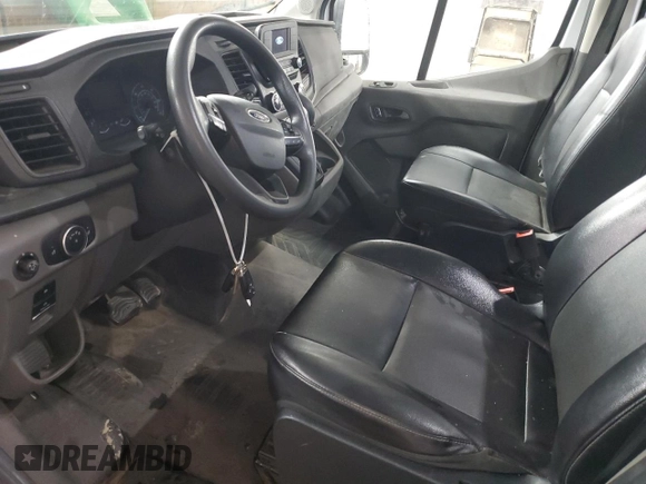 2023 Ford Transit Cargo with VIN 1FTBR3U89PKA70899, listed as a Copart auction lot 77940504 with 62,196 mi miles and Clean Title. Bid and sale history available at DreamBid. Image 7.