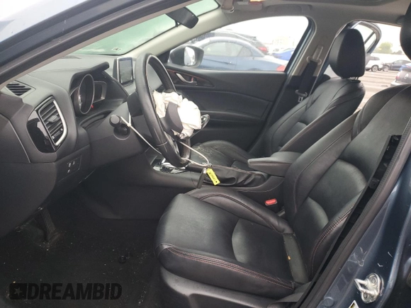 2014 Mazda 3 i Grand Touring with VIN JM1BM1W77E1172938, listed as a Copart auction lot 53194585 with 106,654 mi miles and Salvage Title. Bid and sale history available at DreamBid. Image 7.