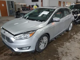 2018 Ford Focus Titanium with VIN 1FADP3N25JL261736, listed as a IAAI auction lot 41032128 with 59,142 mi miles and . Bid and sale history available at DreamBid. Image 17.