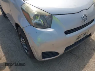 2012 Scion iQ with VIN JTNJJXB02CJ015746, listed as a IAAI auction lot 42266761 with 135,321 mi miles and . Bid and sale history available at DreamBid. Image 12.