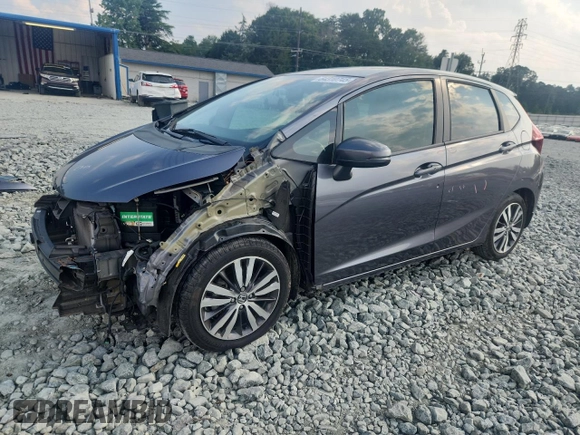 2015 Honda Fit EX-L with VIN 3HGGK5H87FM708737, listed as a Copart auction lot 64310745 with 90,446 mi miles and Salvage title. Bid and sale history available at DreamBid. Image 1.