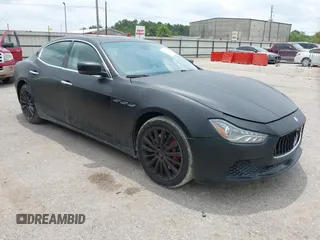 2015 Maserati Ghibli z VIN ZAM57XSA8F1130476, wystawiony jako IAAI lot #42417142 z przebiegiem 131 074 mil mil oraz . Historia ofert i sprzedaży dostępna na DreamBid. Obrazek 1.