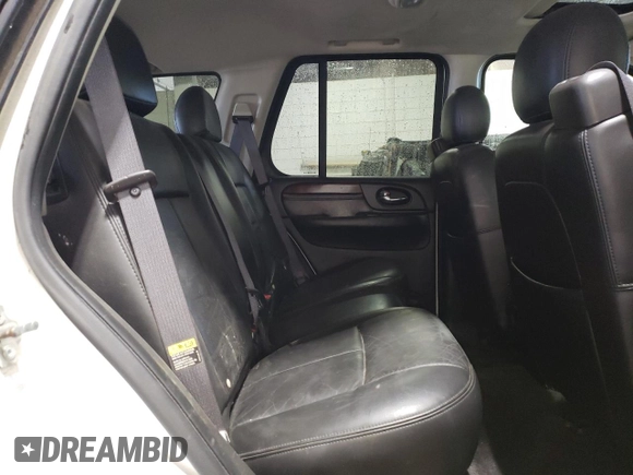 2005 GMC Envoy SLE z VIN 1GKDT13S452360609, wystawiony jako Copart lot #56188495 z przebiegiem 180 046 mil mil oraz Szkoda całkowita • Salvage title. Historia ofert i sprzedaży dostępna na DreamBid. Obrazek 11.