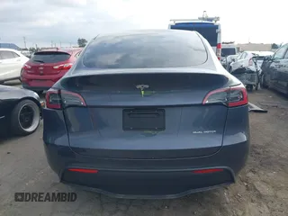 2023 Tesla Model Y Long Range with VIN 7SAYGDEE4PA028440, listed as a IAAI auction lot 41488136 with 29,229 mi miles and . Bid and sale history available at DreamBid. Image 15.