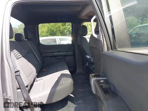 2023 Ford F-150 XL with VIN 1FTFW1E54PFC37083, listed as a IAAI auction lot 42247096 with 28,344 mi miles and . Bid and sale history available at DreamBid. Image 8.