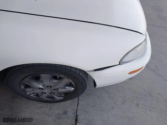 1994 Geo Prizm with VIN 1Y1SK5363RZ081192, listed as a IAAI auction lot 42081796 with 287,952 mi miles. Bid and sale history available at carsss.com. Image 12.