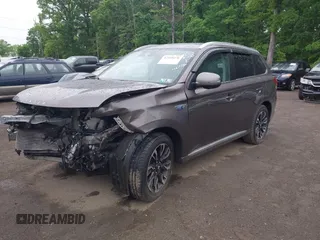 2018 Mitsubishi Outlander SEL with VIN JA4J24A52JZ042127, listed as a IAAI auction lot 42160276 with 106,789 mi miles and . Bid and sale history available at DreamBid. Image 2.