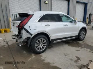 2019 Cadillac XT4 FWD Premium Luxury with VIN 1GYFZCR43KF151044, listed as a Copart auction lot 57912915 with 71,138 mi miles and Salvage title. Bid and sale history available at DreamBid. Image 3.