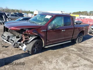 2016 Ford F-150 XLT with VIN 1FTFX1EF1GFC12809, listed as a IAAI auction lot 41336723 with 237,122 mi miles. Bid and sale history available at carsss.com. Image 2.