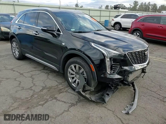 2021 Cadillac XT4 AWD Premium Luxury with VIN 1GYFZDR4XMF016846, listed as a Copart auction lot 82963704 with 44,063 mi miles and Salvage Title. Bid and sale history available at carsss.com. Image 12.