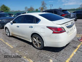 2014 Nissan Altima SV with VIN 1N4AL3AP6EC163563, listed as a IAAI auction lot 41964614 with 188,516 mi miles and . Bid and sale history available at DreamBid. Image 3.