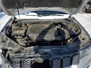 2018 Jeep Grand Cherokee Altitude z VIN 1C4RJFAG6JC452988, wystawiony jako Copart lot #88226035 z przebiegiem 120 015 mil mil oraz Szkoda całkowita • Salvage title. Historia ofert i sprzedaży dostępna na DreamBid. Obrazek 12.