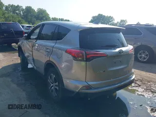 2018 Toyota RAV4 LE with VIN JTMZFREV3JJ161811, listed as a IAAI auction lot 40131640 with 114,330 mi miles. Bid and sale history available at carsss.com. Image 3.