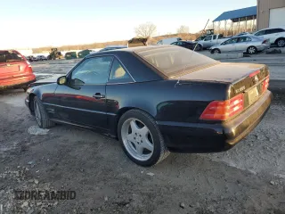 1999 Mercedes-Benz SL-Class with VIN WDBFA68F9XF178143, listed as a Copart auction lot 83255114 with 129,970 mi miles and Salvage Title. Bid and sale history available at carsss.com. Image 2.
