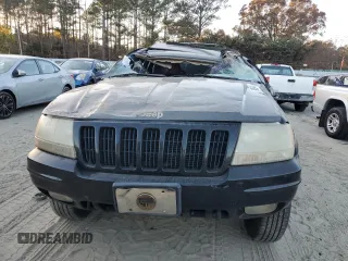 1999 Jeep Grand Cherokee Limited with VIN 1J4GW68S7XC676809, listed as a Copart auction lot 79059944 with 196,391 mi miles and Salvage Title. Bid and sale history available at carsss.com. Image 5.