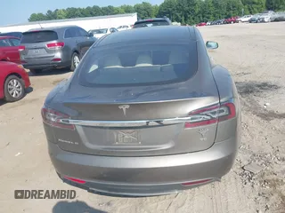2016 Tesla Model S 70 with VIN 5YJSA1E1XGF126620, listed as a IAAI auction lot 40227035 with 71,400 mi miles and . Bid and sale history available at DreamBid. Image 16.