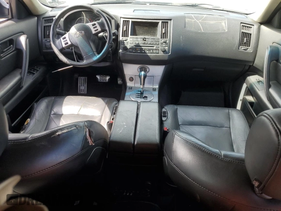 2003 Infiniti FX Options z VIN JNRAS08W03X208799, wystawiony jako Copart lot #52866345 z przebiegiem 229 666 mil mil oraz Szkody całkowita. Historia ofert i sprzedaży dostępna na DreamBid. Obrazek 8.