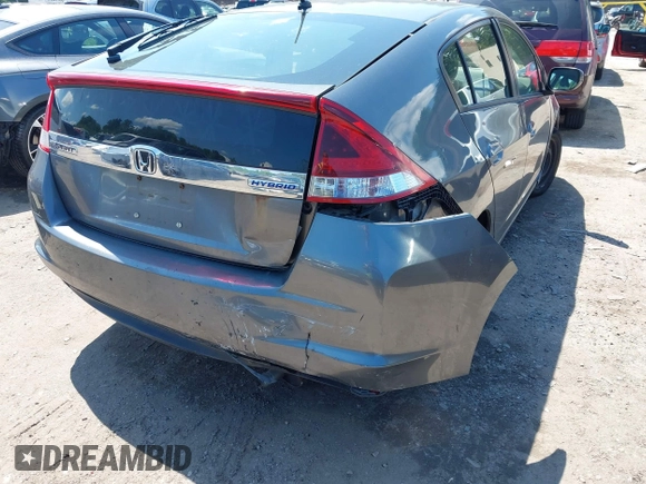 2013 Honda Insight with VIN JHMZE2H31DS002352, listed as a IAAI auction lot 42551515 with 148,393 mi miles and . Bid and sale history available at DreamBid. Image 6.