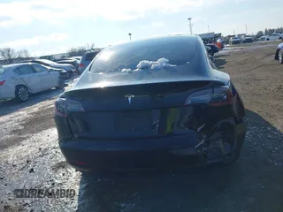 2020 Tesla Model 3 Standard Range Plus z VIN 5YJ3E1EA6LF662080, wystawiony jako IAAI lot #41410445 z przebiegiem Nie podano mil oraz . Historia ofert i sprzedaży dostępna na DreamBid. Obrazek 6.