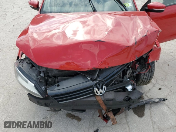2012 Volkswagen Jetta SE z VIN 3VWDP7AJ7CM122656, wystawiony jako Copart lot #51151765 z przebiegiem Nie podano mil oraz Szkoda całkowita • Salvage title. Historia ofert i sprzedaży dostępna na DreamBid. Obrazek 12.