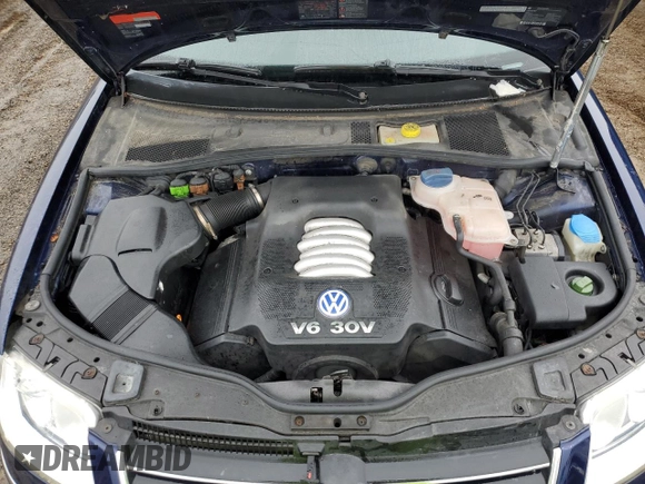 2002 Volkswagen Passat GLX z VIN WVWTH63B32P069555, wystawiony jako Copart lot #85990984 z przebiegiem 69 310 mil mil oraz Czysty tytuł • Clean title. Historia ofert i sprzedaży dostępna na DreamBid. Obrazek 11.