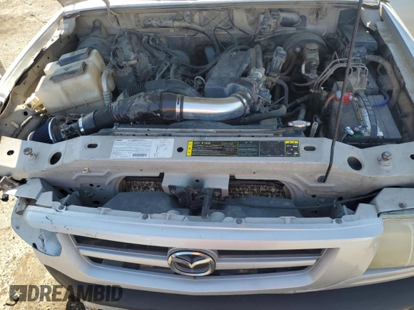2003 Mazda B-Series Truck DS z VIN 4F4YR16U13TM01916, wystawiony jako Copart lot #53642875 z przebiegiem 86 309 mil mil oraz Szkoda całkowita • Salvage title. Historia ofert i sprzedaży dostępna na DreamBid. Obrazek 11.
