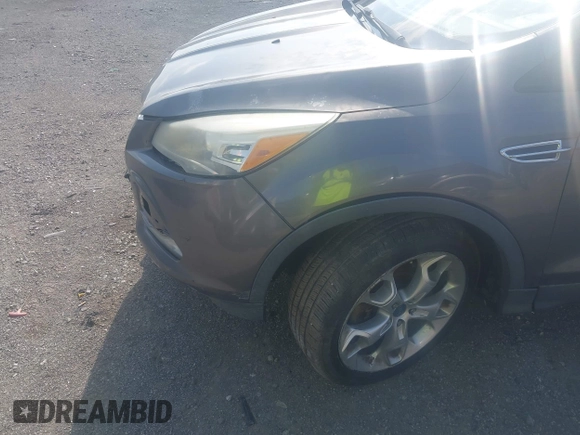 2013 Ford Escape Titanium with VIN 1FMCU0J92DUB36428, listed as a IAAI auction lot 42144682 with 263,600 mi miles and . Bid and sale history available at carsss.com. Image 14.