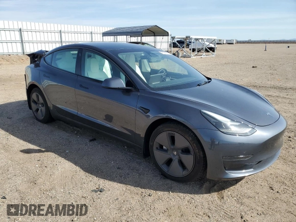 2023 Tesla Model 3 with VIN 5YJ3E1EA8PF648073, listed as a Copart auction lot 49284775 with 20,498 mi miles and Salvage Title. Bid and sale history available at DreamBid. Image 4.