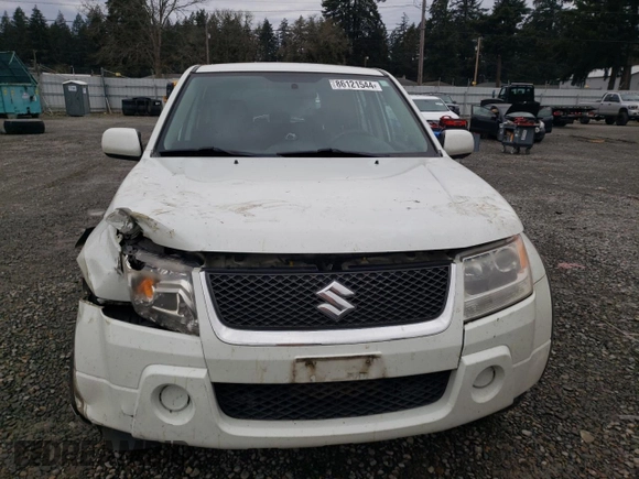 2008 Suzuki Grand Vitara w/Spare & Cargo Covers с VIN JS3TD941084101778, выставлен на аукционе Copart как лот 86121544 с пробегом 125 802 миль миль и Списание • Salvage title. История ставок и продаж доступна на DreamBid. Изображение 5.