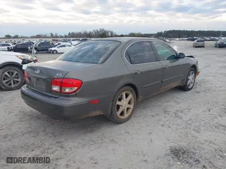 2002 Infiniti I35 Luxury with VIN JNKDA31A32T022128, listed as a IAAI auction lot 41384659 with 169,418 mi miles. Bid and sale history available at carsss.com. Image 4.