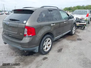 2011 Ford Edge SEL with VIN 2FMDK3JCXBBA79762, listed as a IAAI auction lot 41897740 with 245,825 mi miles. Bid and sale history available at carsss.com. Image 4.