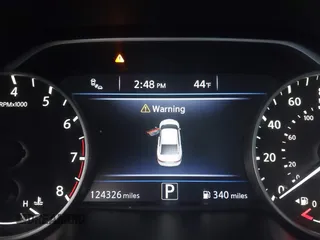 2019 Nissan Maxima Platinum z VIN 1N4AA6AV6KC372254, wystawiony jako IAAI lot #41519515 z przebiegiem 124 326 mil mil oraz . Historia ofert i sprzedaży dostępna na DreamBid. Obrazek 15.