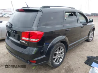 2013 Dodge Journey R/T with VIN 3C4PDDEG7DT591789, listed as a IAAI auction lot 40843769 with 188,001 mi miles and . Bid and sale history available at DreamBid. Image 4.