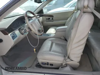 2002 Cadillac Eldorado z VIN 1G6EL12Y32B102263, wystawiony jako Copart lot #77108634 z przebiegiem 43 162 mil mil oraz Nie do naprawy • Non repairable. Historia ofert i sprzedaży dostępna na DreamBid. Obrazek 7.