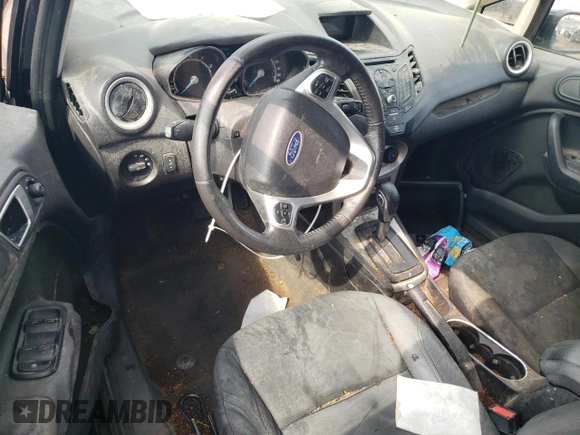 2016 Ford Fiesta SE z VIN 3FADP4EJ3GM155158, wystawiony jako Copart lot #55883465 z przebiegiem 116 184 mil mil oraz Czysty tytuł • Clean title. Historia ofert i sprzedaży dostępna na DreamBid. Obrazek 8.