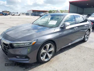2020 Honda Accord Touring z VIN 1HGCV2F93LA023062, wystawiony jako IAAI lot #42596772 z przebiegiem 53 586 mil mil oraz . Historia ofert i sprzedaży dostępna na DreamBid. Obrazek 18.