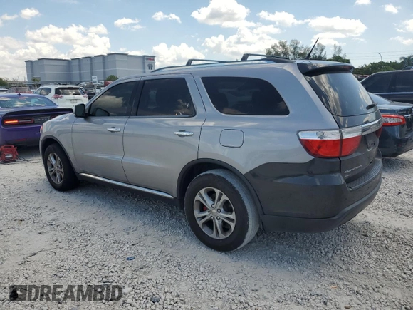 2013 Dodge Durango Crew z VIN 1C4RDJDGXDC696119, wystawiony jako Copart lot #58226905 z przebiegiem 154 915 mil mil oraz Czysty tytuł • Clean title. Historia ofert i sprzedaży dostępna na DreamBid. Obrazek 2.