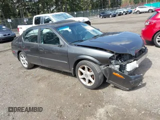 2000 Nissan Maxima GXE z VIN JN1CA31A8YT028760, wystawiony jako IAAI lot #41982643 z przebiegiem 126 480 mil mil oraz . Historia ofert i sprzedaży dostępna na DreamBid. Obrazek 1.
