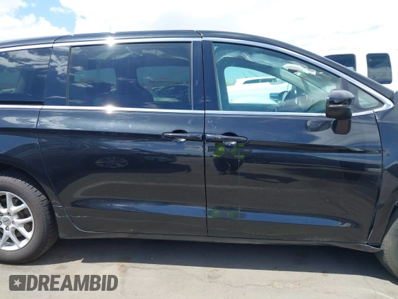 2023 Chrysler Pacifica Touring L with VIN 2C4RC1BG7PR510912, listed as a IAAI auction lot 41967473 with 67,907 mi miles and . Bid and sale history available at DreamBid. Image 14.