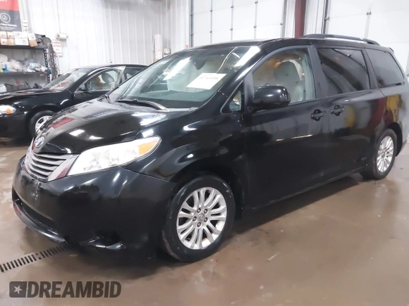 2011 Toyota Sienna XLE AAS with VIN 5TDYK3DC3BS141051, listed as a IAAI auction lot 41741058 with 236,626 mi miles. Bid and sale history available at carsss.com. Image 18.
