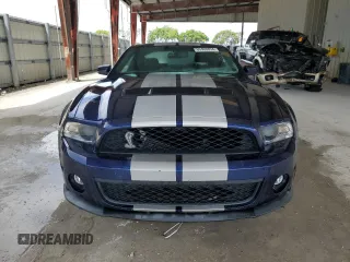 2010 Ford Mustang GT500 with VIN 1ZVBP8JSXA5160889, listed as a Copart auction lot 69408854 with 64,588 mi miles and Salvage title. Bid and sale history available at DreamBid. Image 5.