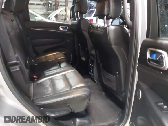 2018 Jeep Grand Cherokee High Altitude with VIN 1C4RJFCGXJC502580, listed as a IAAI auction lot 41419329 with 90,713 mi miles. Bid and sale history available at carsss.com. Image 8.
