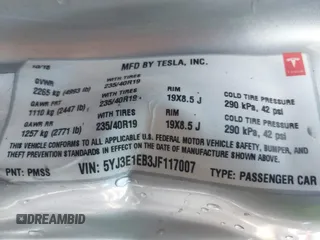 2018 Tesla Model 3 Long Range Battery z VIN 5YJ3E1EB3JF117007, wystawiony jako IAAI lot #41753572 z przebiegiem 82 444 mil mil oraz . Historia ofert i sprzedaży dostępna na DreamBid. Obrazek 9.